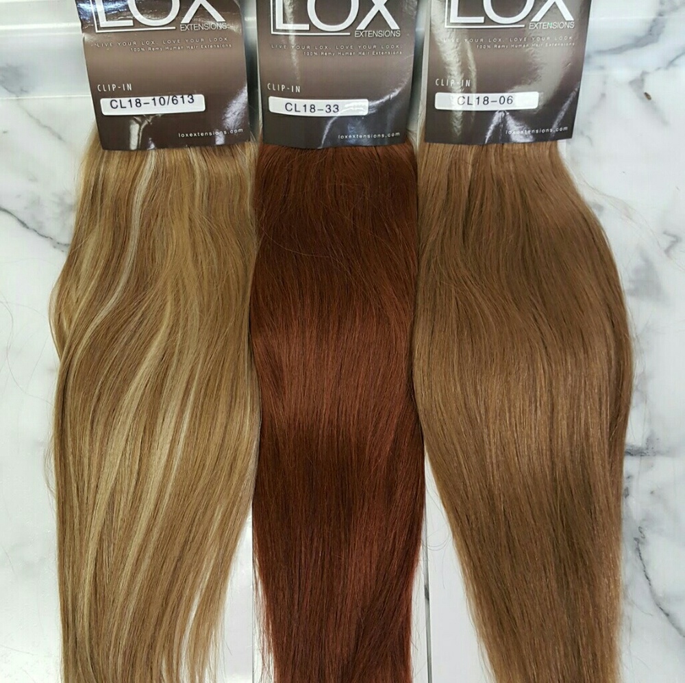 18 INCH LOX CLIP - IN HAIIR EXTENSIONS . 100% HUMA